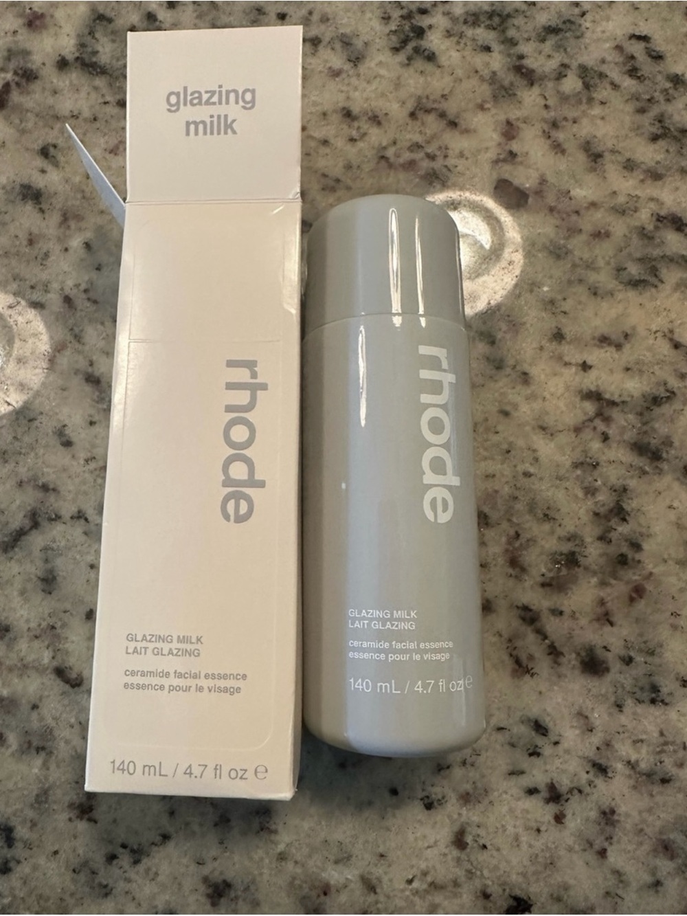 RHODE Glazing Milk Ceramide Essence - Light Gray Bottle